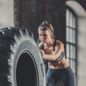 Sports woman with a wheel